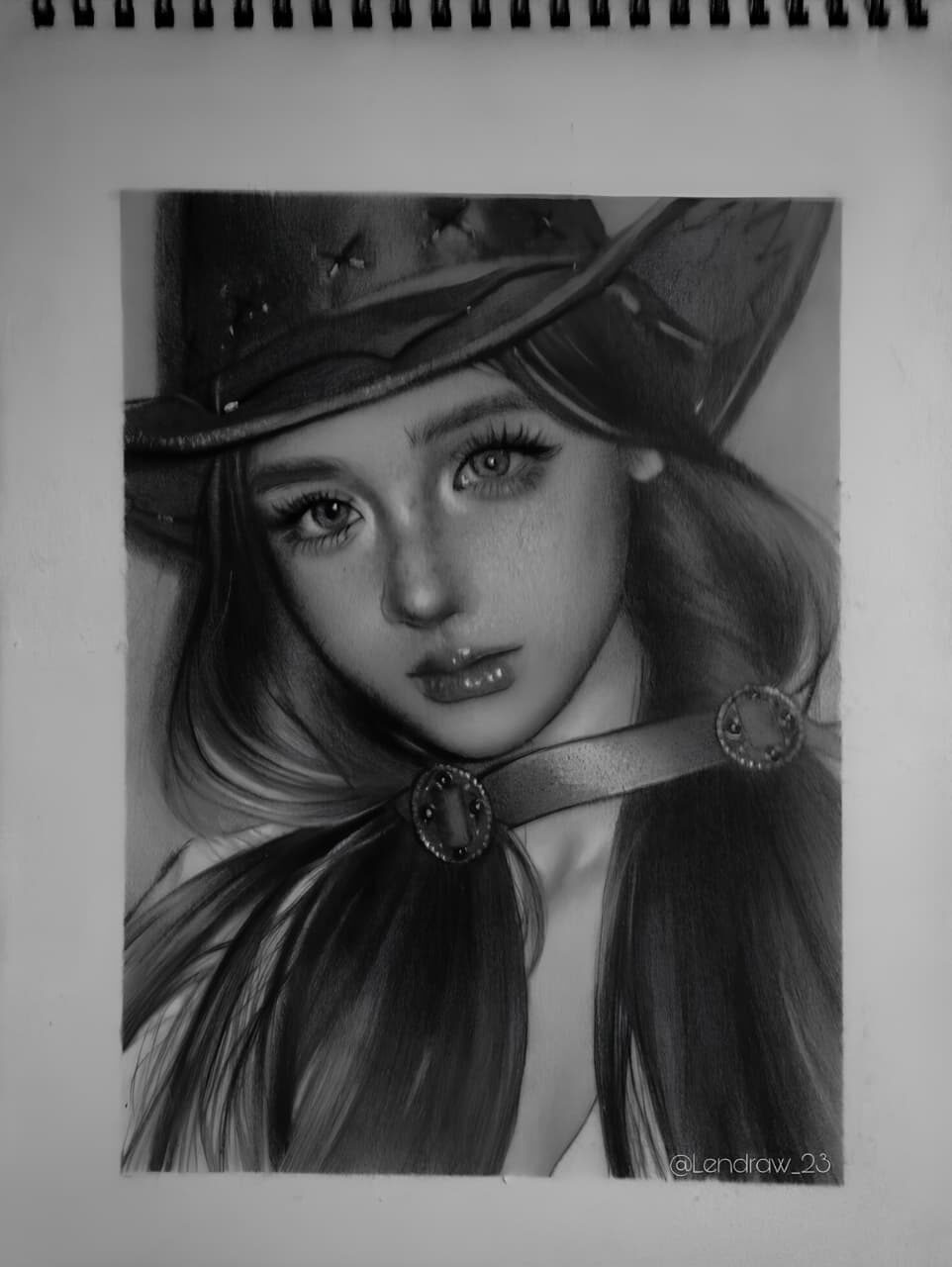 Traditional pencil portrait of a girl wearing a wide-brimmed hat